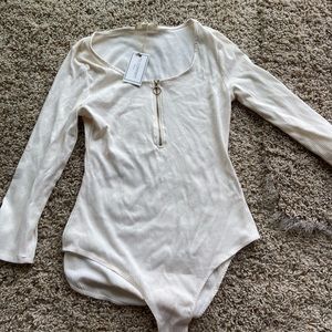 Cream body suit